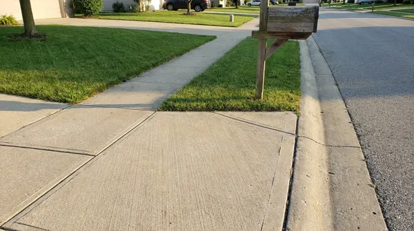 New concrete sidewalk poured in a Madison, AL neighborhood